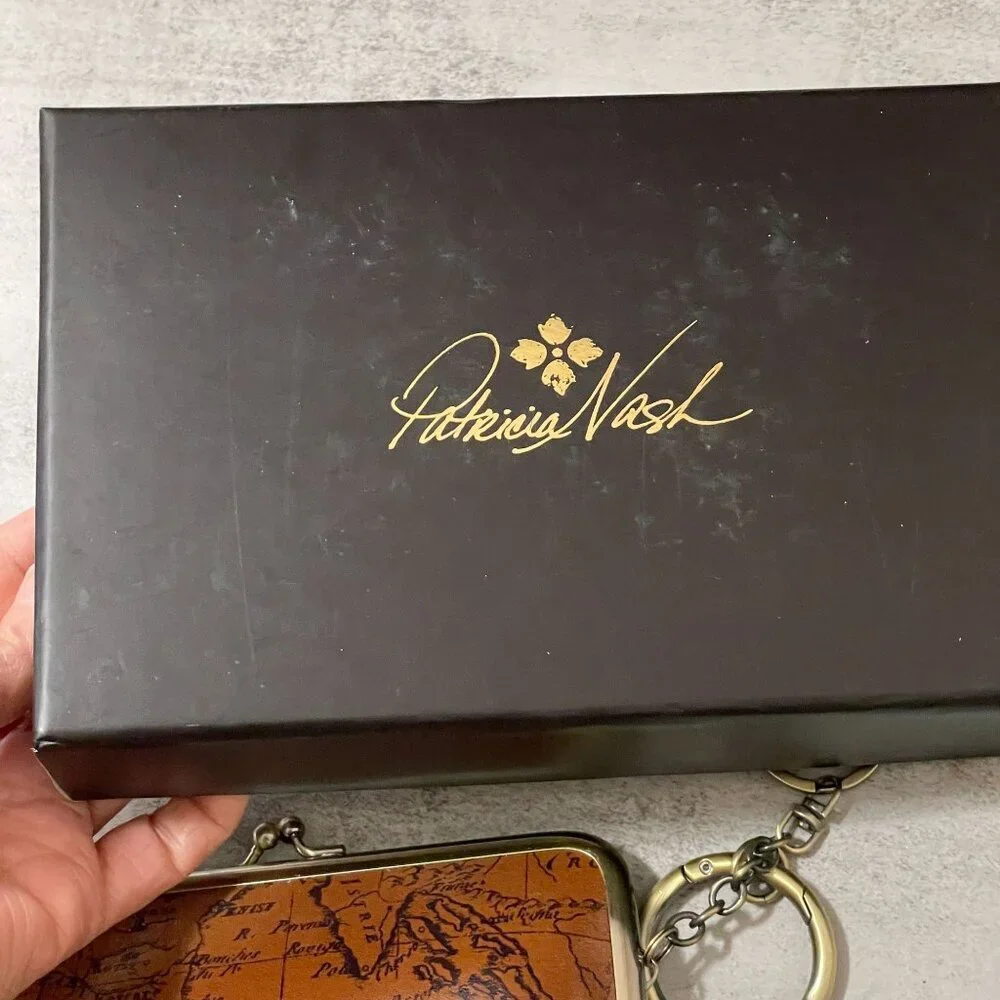 NWT Patricia Nash Lorella Riot Rust Signature Map Kiss Lock Frame Leather Wallet